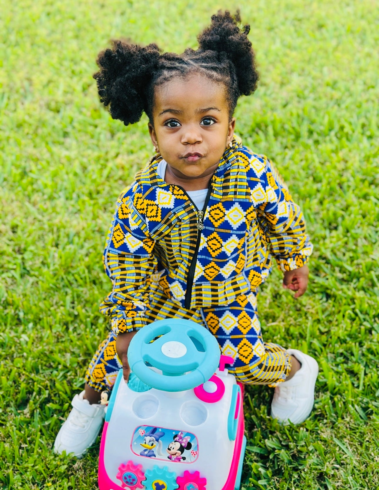 Two-piece kids African pants and jacket for boys and girls one to two years.