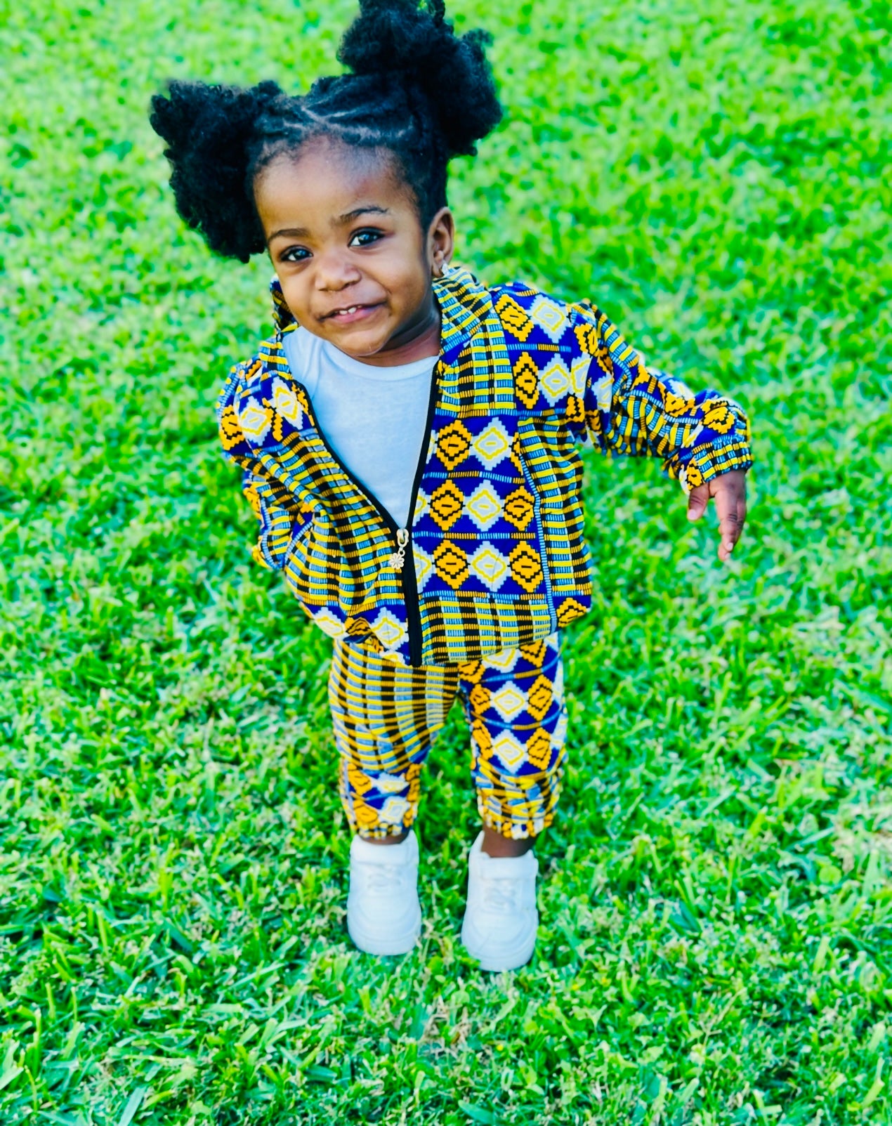 Two-piece kids African pants and jacket for boys and girls one to two years.